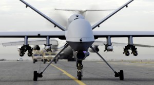 A fully armed MQ-9 Reaper taxis down an Afghanistan runway 